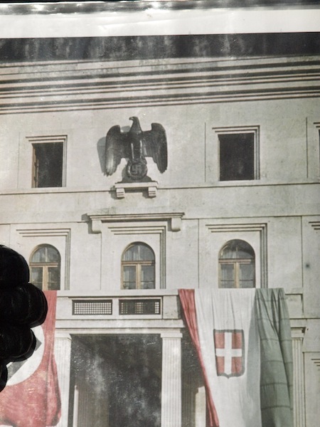 The eagle and swastika symbol on the front of Nazi headquarters during WW2.