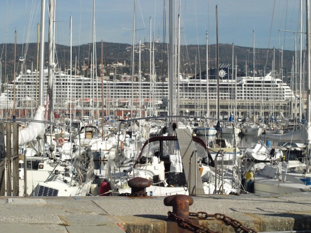The port side view of the cruise liner near the Lloyd Triestino building. 