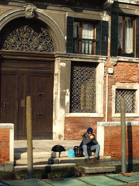Our romantic lunch spot today. The most pleasing aspect about this spot was it was in full sun. Look at the wrought iron work above the door in the background. 