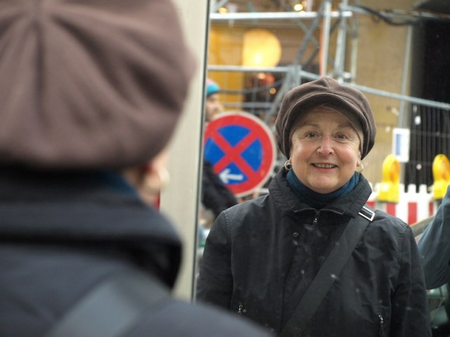 Our gentle friend, Margit, photographed in a window reflection.