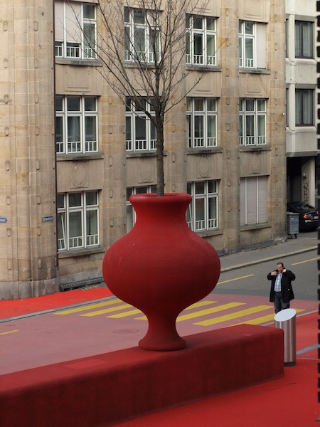  Artistic pot with a living tree. 