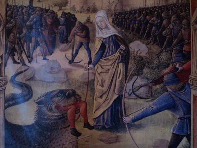 Here’s slim, delicate, beautiful Martha trying to quell the beastly dragon. 