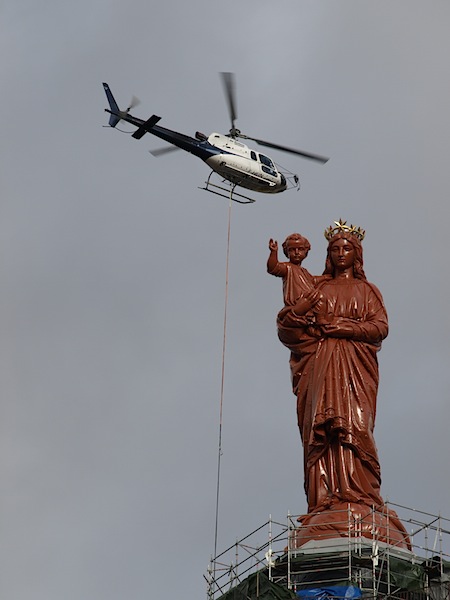 A spruced up Virgin Mary, Jesus waving me a blessing and the helicopter taking away scaffolding. 