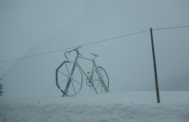 Mysterious giant bike in the snowstorm. 