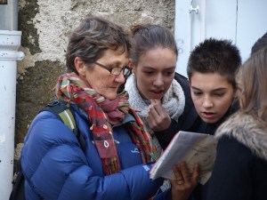Bev getting directions from a group of school kids. 