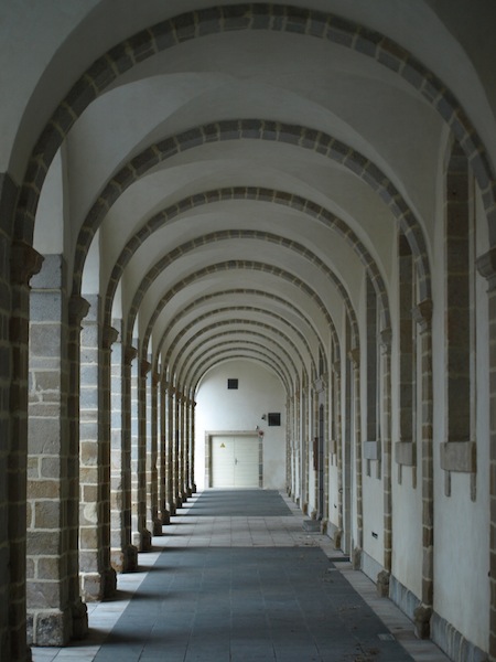 A colonnade outside the part of the abbey complex that houses a museum.