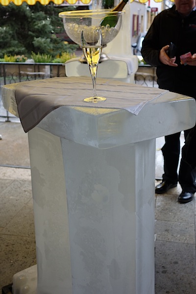 A table made from ice outside a café. 