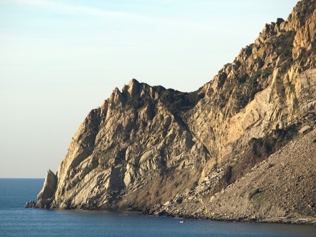 Close up of Punta Mesco. In ancient times sandstone was mined here. 