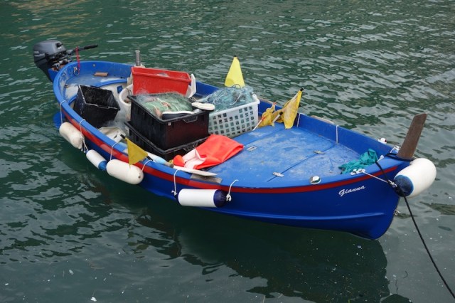 A traditional boat within the protection of the breakwater. 