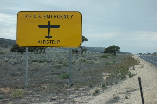 The road across the Nullarbor is used in places as an emergency airstrip. R.F.D.S. stands for Royal Flying Doctor Service. 