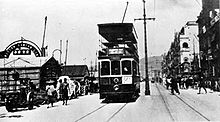 Tram on Connaught Road West in the 1930s. What’s interesting about this picture is that the atmosphere is smog free and thus it is possible to see the distant hills. 
