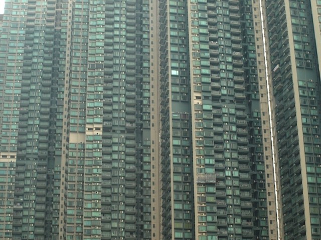 Packing ‘em in. Some people actually live in metal cages within apartments like these. I assume the cages are for security of belongings. 