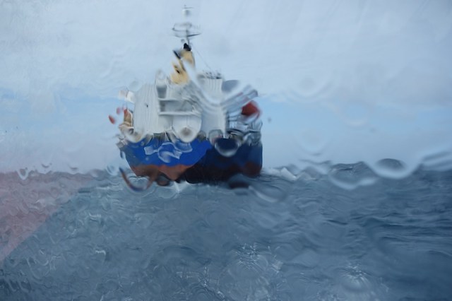 Pilot boat awash. Passing by the stern of the cargo ship we rendezvoused with. 