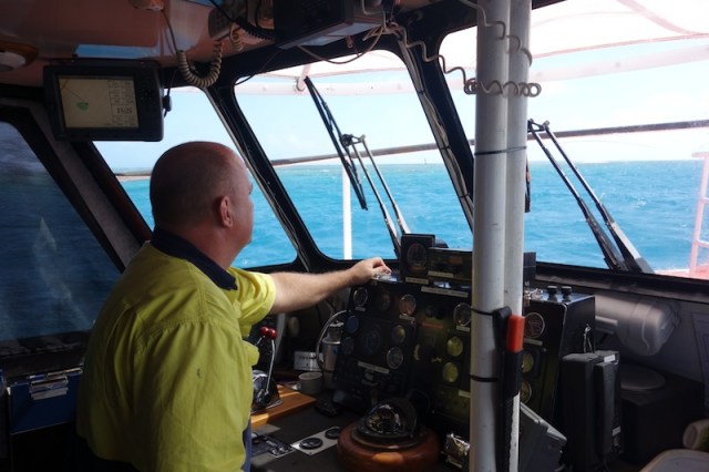 Captain Mark at the helm of P.V. Archer. 