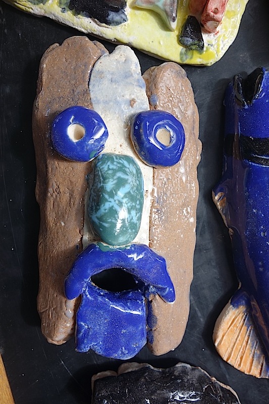 Mask detail. The unique feature about this piece is the way the students have used two different colour clays and mixed glazes to create an opalised effect on the nose.