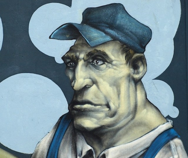 Detail of the worker clutching the torpedo. I have not been able to find the name of the artist who did this work but whoever you are, thankyou for sharing your creative spirit with us. 