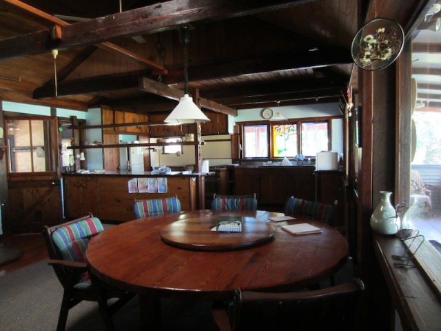 Dining area. The window sill on right is the one I’m putting into place in the previous photograph. The dining room table is two metres in diameter and is made from timber once used as concrete formwork. 