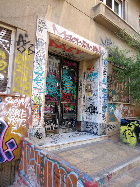 Athens. This graffiti could in no way be considered art; it is blatant vandalism. Imagine how upset you would be if this was your front door. 
