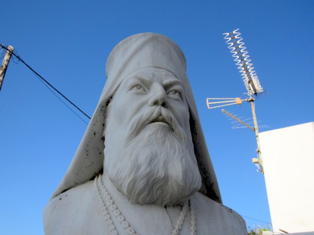 Bishop Eftymios Karathas outside Lariotissa Church in Potamos. Tuning into the BBC? 