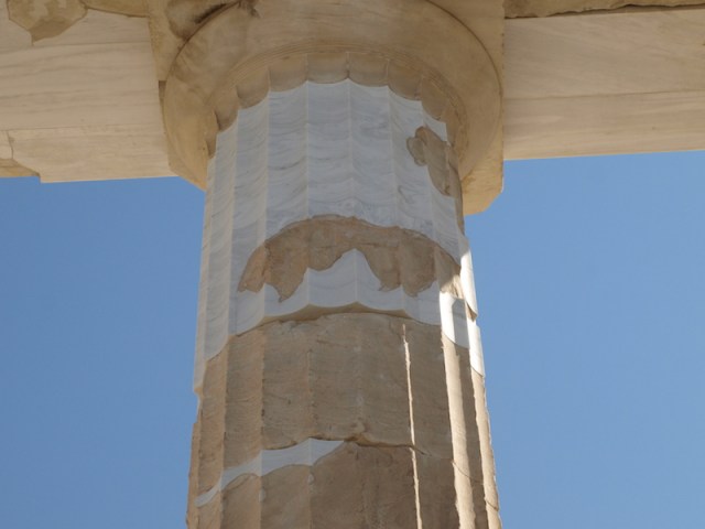 Doric order column showing restoration efforts.