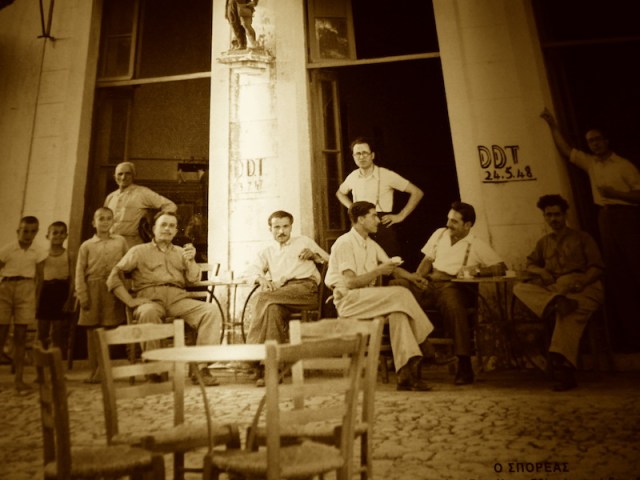 Relaxing after the war outside Livaditis Kafeneion (now Astikon) Potamos. It was in this café that the freedom fighters used to meet and discuss their plan of action. Copyright Emm.Sofios.