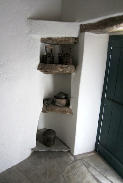 Behind the bedroom door.