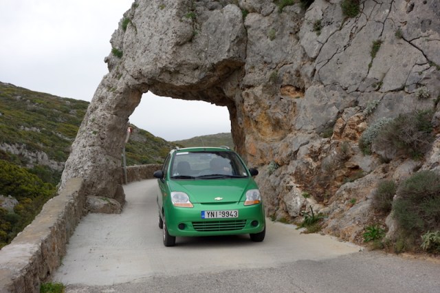 Road out of the monastery passing through a granite arch. 