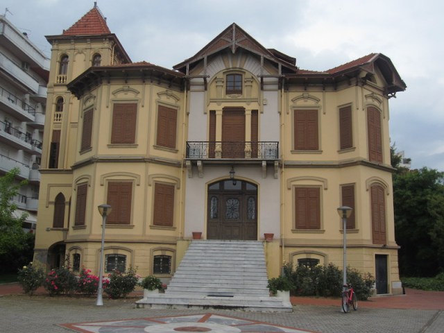 Old and new. No cars parked out the front, just a simple bike! The new apartments are on the left. 