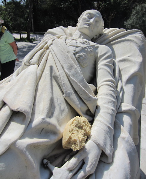 A thoughtful Athenian left bread for this reclining statue.