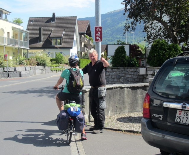 Getting directions with the aid of the retractable tape. The tape is in front of Bev’s face.