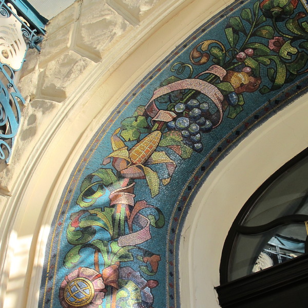Mosaic detail in the arch over the vestibule of the Paris Hotel. 