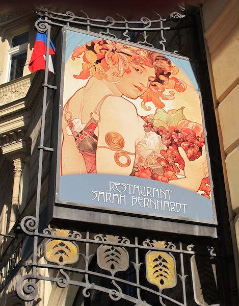 Reproduction of Alphonse Mucha’s painting of French actress Sarah Bernhardt outside the Paris Hotel. 