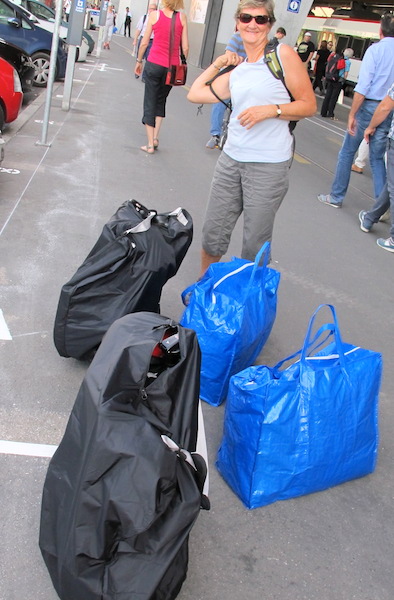Zurich station. Folded bikes in black bags and our gear, including panniers, in the blue bags. 
