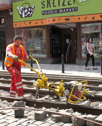 Motorised socket screwing down the bolts holding the fishplates and line to the sleepers. 