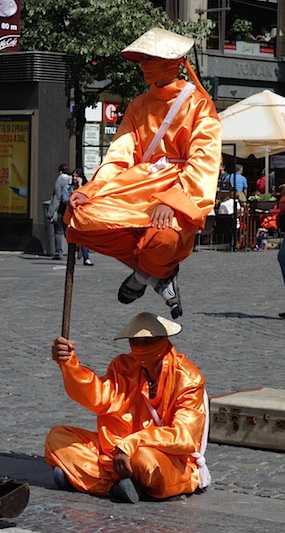 A balancing busker. 