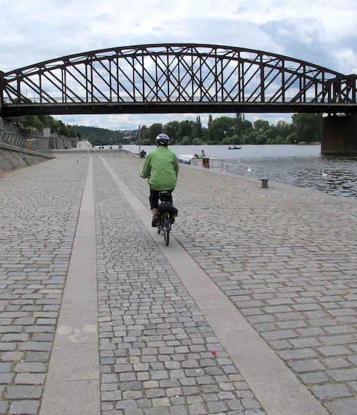 Local authorities efforts to provide a bump free bike path. Granite slabs are a smoother ride than cobblestones. The Vltava (Moldau) riverside path. 