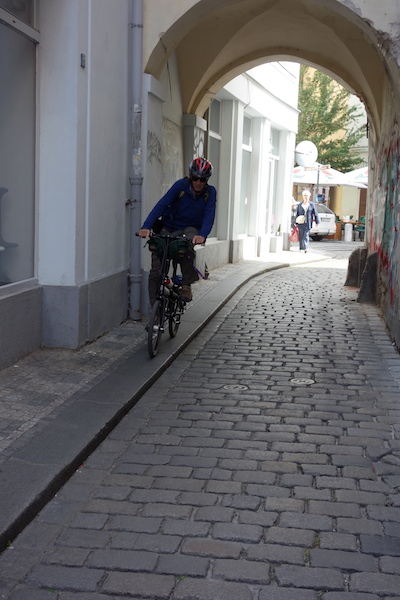 Riding the curb was smoother than the cobblestones, it took some balancing though. 