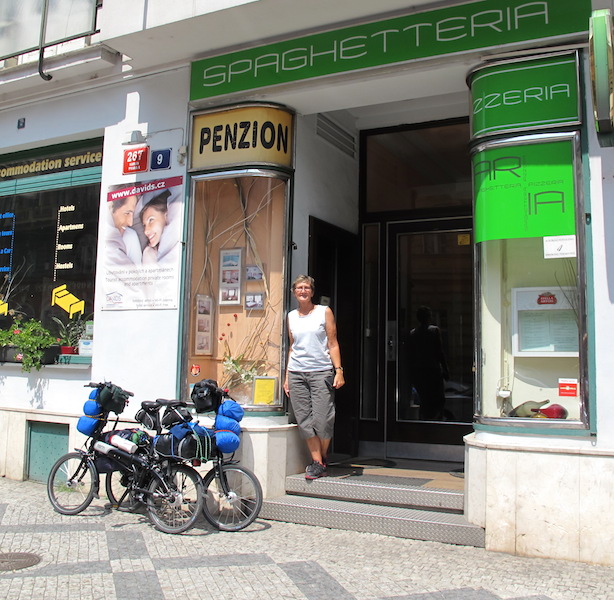 At the front of David’s Guesthouse and the Spaghetteria on Krizikova Street. 