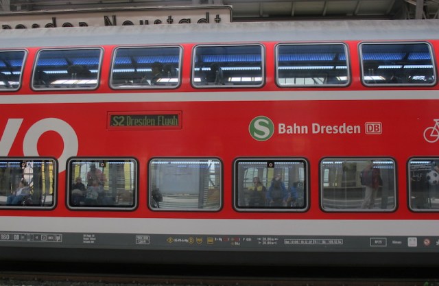 A train carriage on an adjoining platform. The reflections in the windows are like paintings on a gallery wall, art is everywhere. 