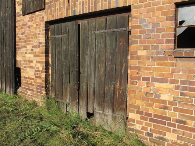 Barn doors. Note the cat hole in the door. 
