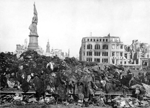 Piles of bodies prior to cremation. From Bundesarchive via Wikipedia.. 
