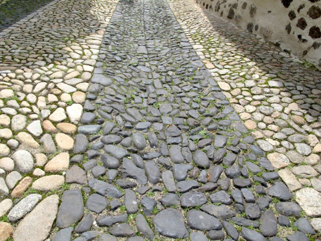 Path on the way down from Chapel of Saint Michel d’Aigulhe . Waterworn cobblestones were used for pathways as they were inexpensive and their shape enabled horse and donkey hooves to grip. 