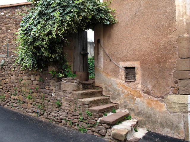 Another one. I like the electric wire coming out of the small vented window running up to the door buzzer. 