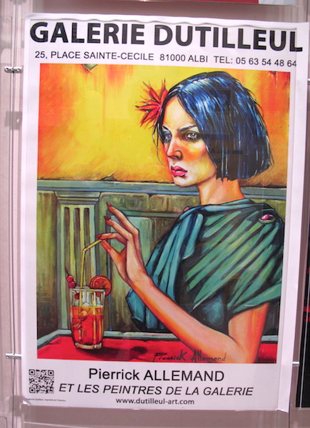 A poster in a shop window of Albi. Is she a reincarnated Albigensian thinking of wrongs committed in centuries past? Regardless, I love the artistry. 