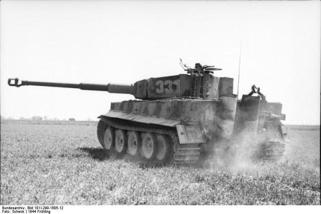 A formidable German Panzer Tiger tank in the fields of France. Image credit Bundersarchive. 