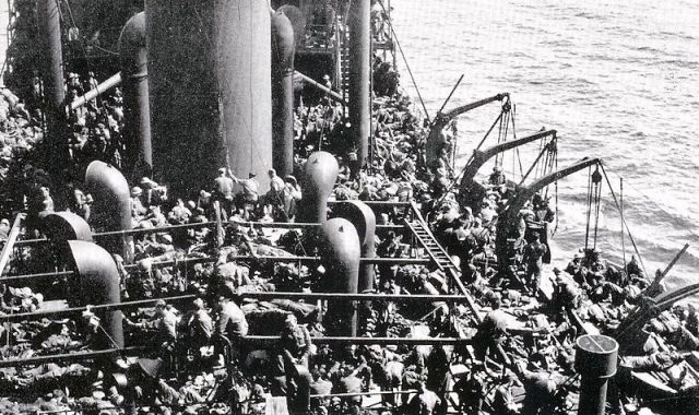 Troop evacuation on SS Guinean during operation Ariel from Port Le Verdon docks. Image via Wikipedia. 