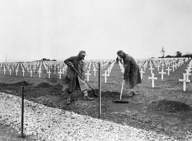 German prisoners of war working in an Allied cemetery Normandy after the D-Day invasion. Photo credit: AP via via http://vcepinc.org web page