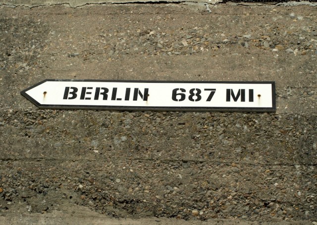 Sign on a bunker at Utah Beach. Berlin1105 kilometres. 