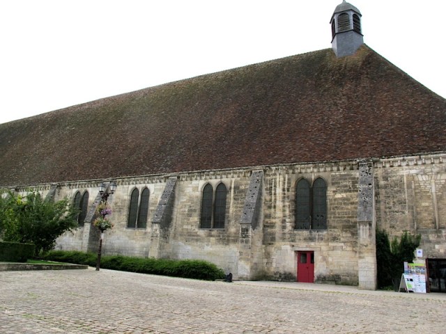 Hospital in Tonnerre. Nothing flash to look at but an amazing roof structure. Note the bullet and shrapnel damage on the buttresses. 