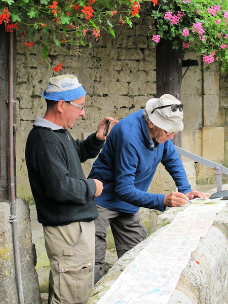 Watercolouring our visit and Yves getting a phone photo off to his family.